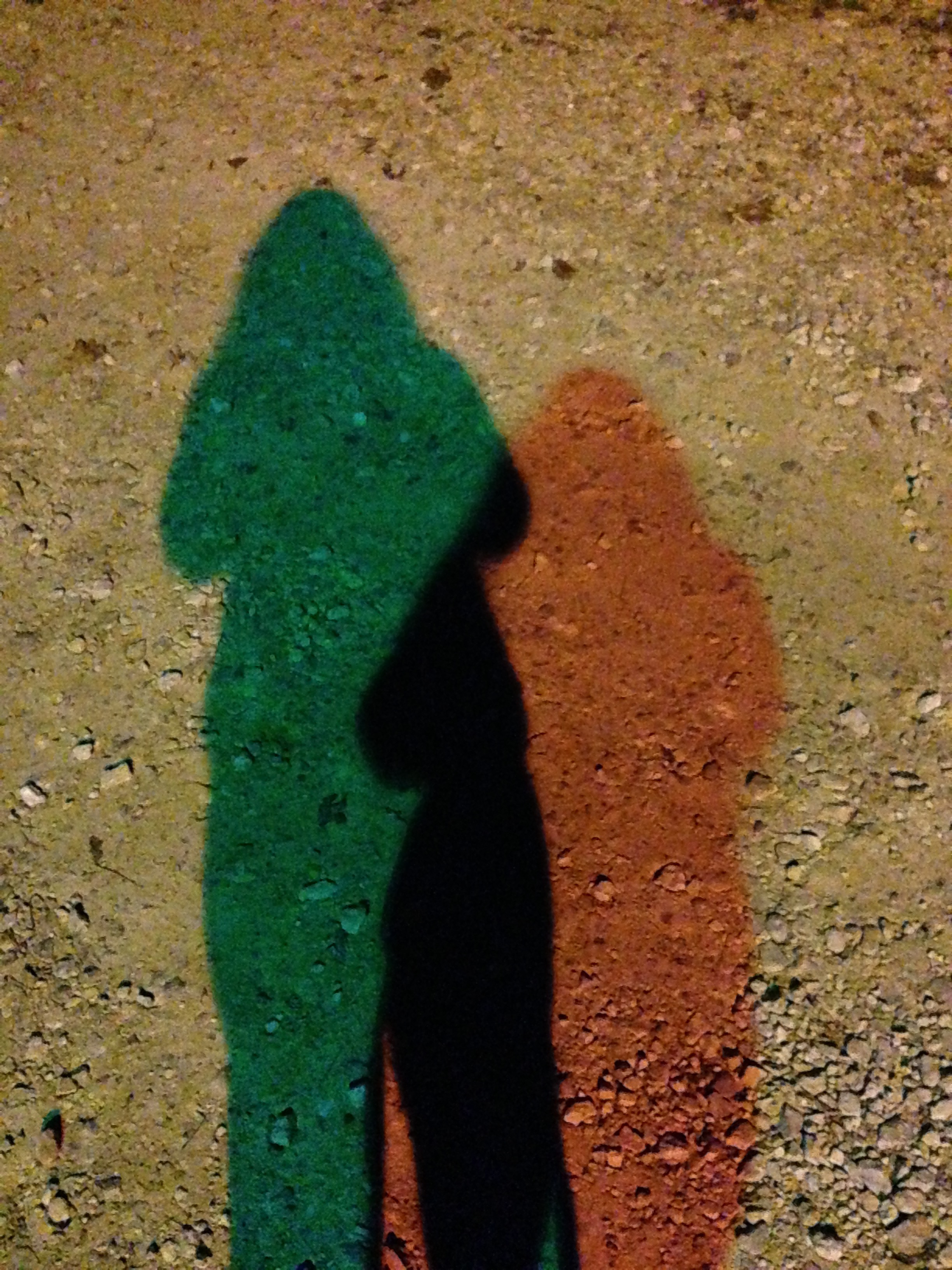 colored-shadows: two different colors of light cause two colors of shadow